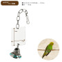 Un jouet miroir pour oiseaux